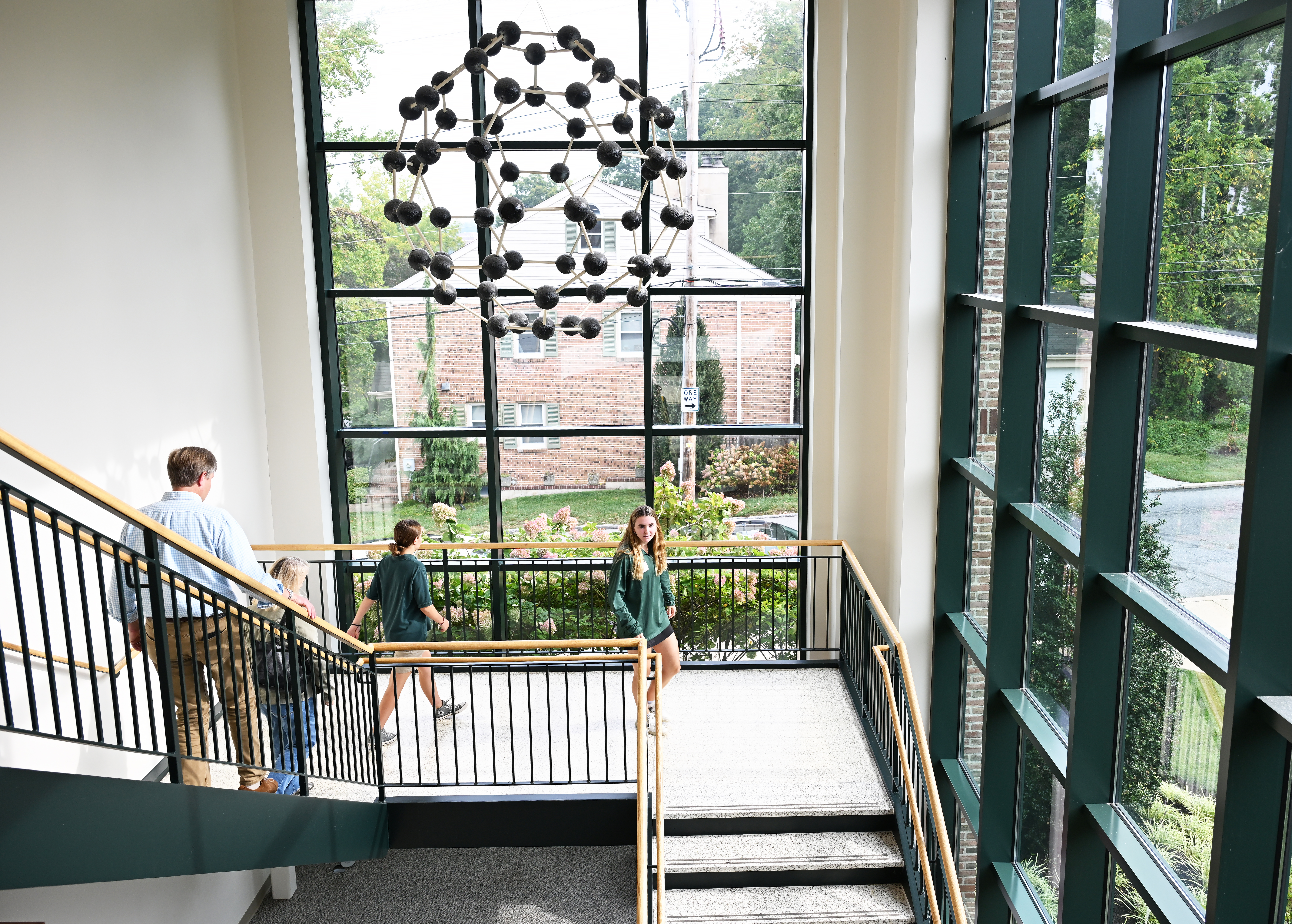 Student giving prospectives a tour around Tower Hill.